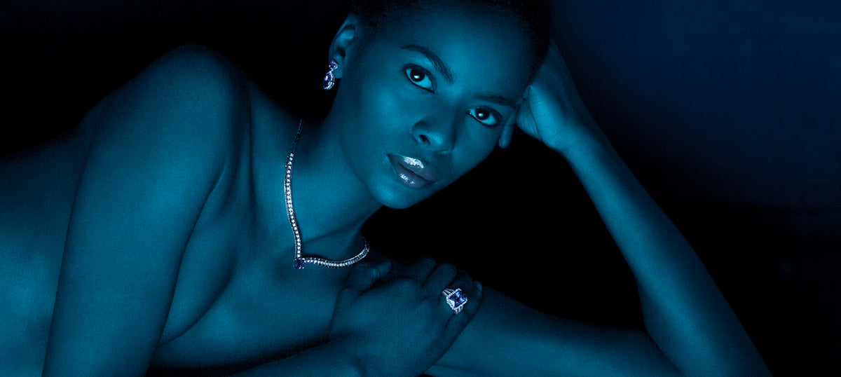 Ayanda model with Tanzanite jewelry, Tanzanite ring, Tanzanite earrings and a Tanzanite pendant.